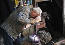 Aging, Output Per Capita and Secular Stagnation