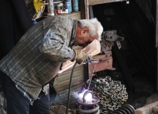 Aging, Output Per Capita and Secular Stagnation