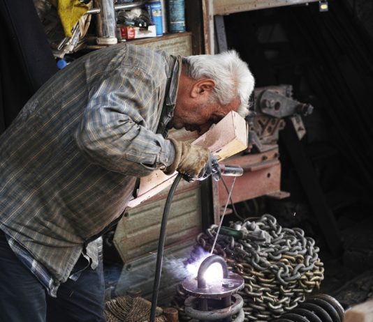 Aging, Output Per Capita and Secular Stagnation