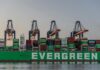US Trade Deficit Stabilizes as Post-Tariff ‘Front-Loading’ Fades massive cargo ship at rotterdam port in sunset